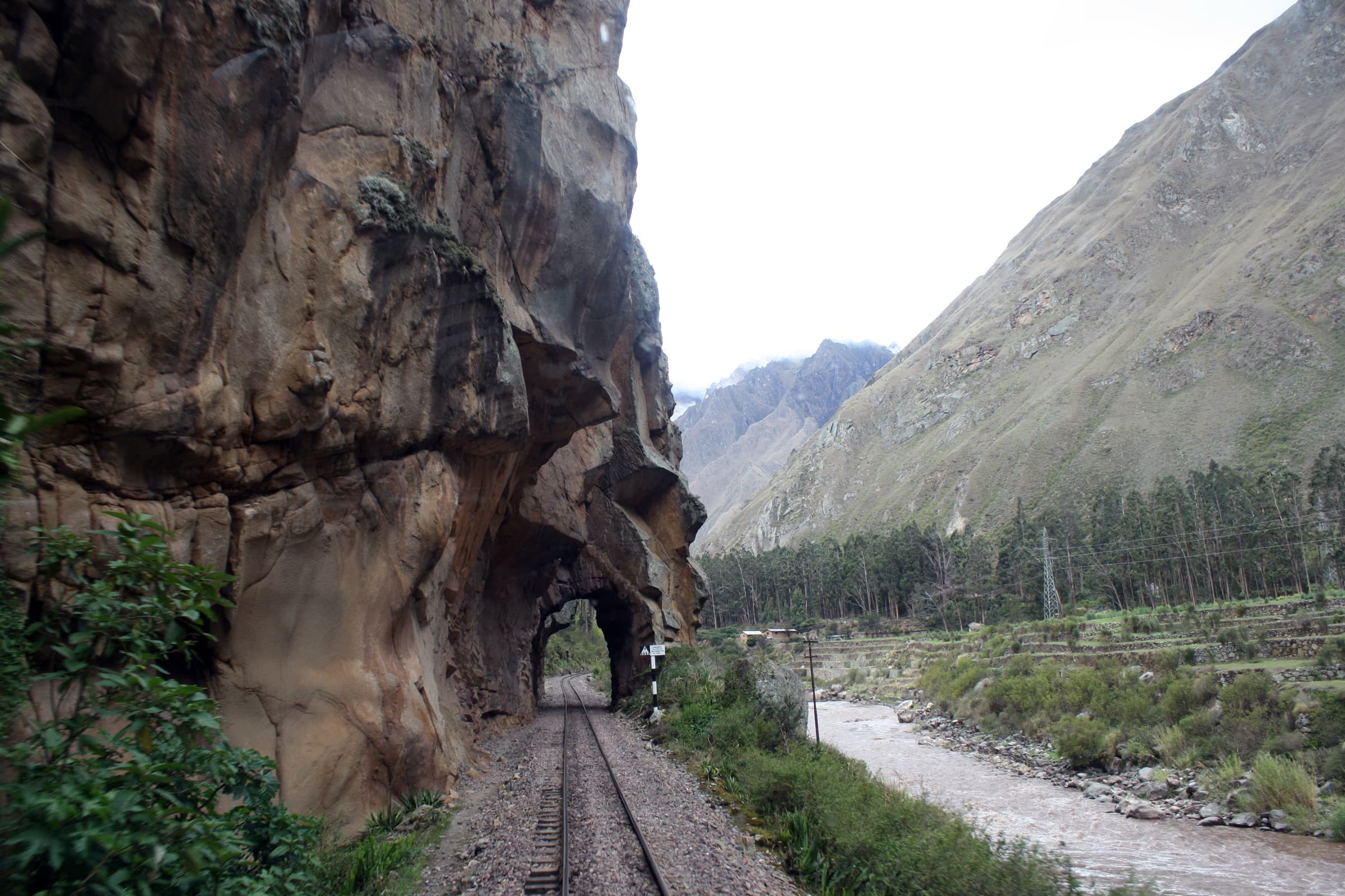 Train tracks running through a rocky canyon in Peru